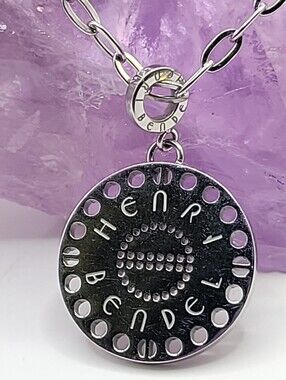 Henri Bendel Influencer Logo Pendant Necklace Silver Tone Multi Adjustable.